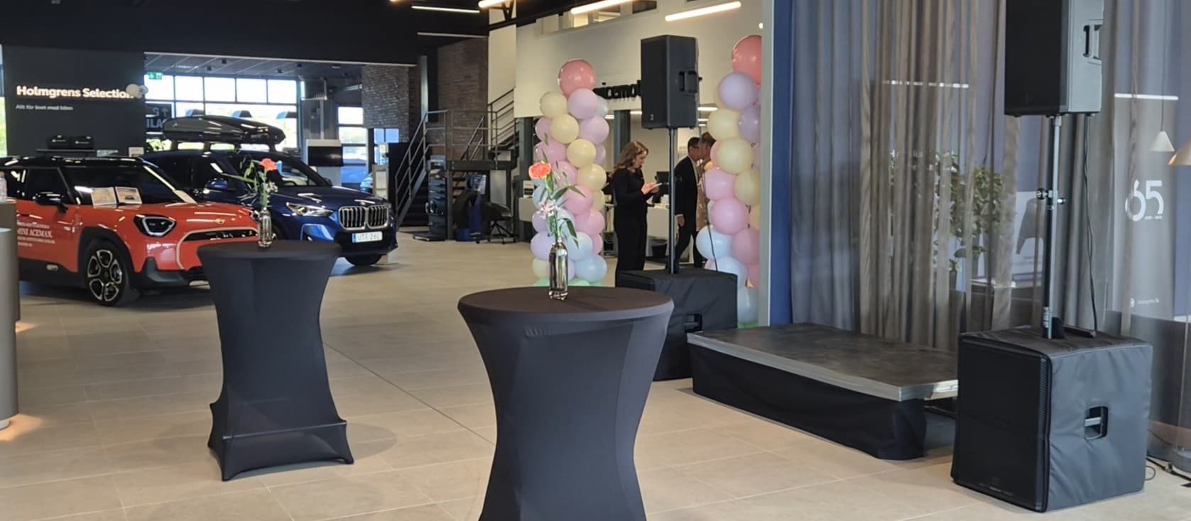 Cars and a PA-system at a car dealership company